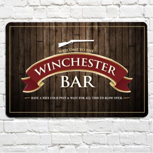 THe winchester pub metal sign, red ribbon